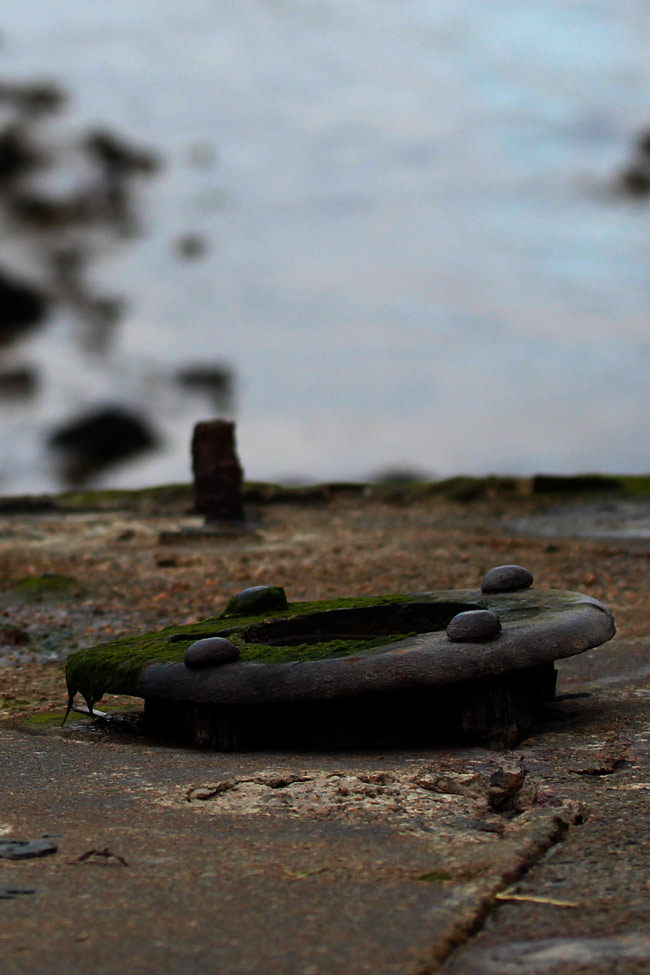 Deck porthole, concrete hulk, Purton